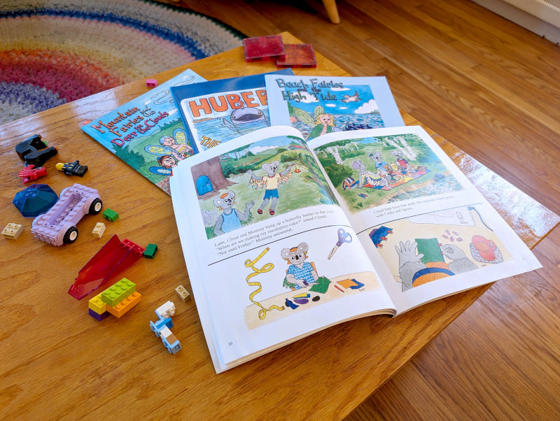 A pile of colorful children's books by author illustrator Dorothy Tully