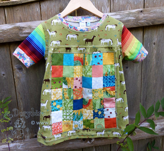 Girls Patchwork Dress, green with horses and farm themed quilt square patchwork panel, rainbow sleeves. Dorybird handmade baby and kids clothes